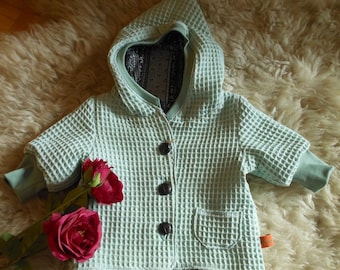 Baby jacket size. 62