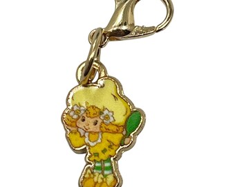 Llavero vintage de Strawberry Shortcake con forma de merengue de limón y tirador de cremallera para bolso, acrílico dorado