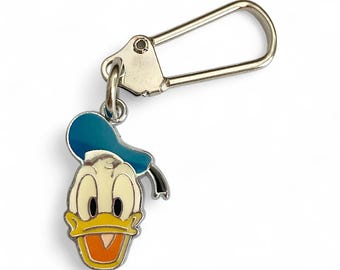 Llavero esmaltado con tirador de cremallera y cierre de seguridad para bolso de mano del Pato Donald