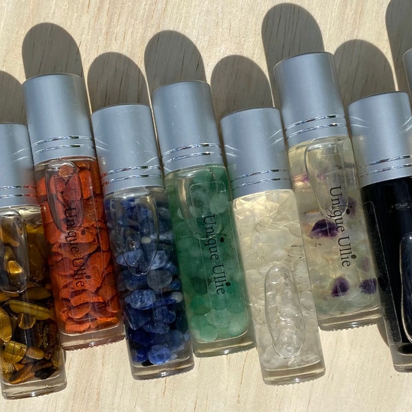 Crystal infused Coconut and Sunflower roll on oil lip gloss with crystal roller ball (9 different crystals to choose from)