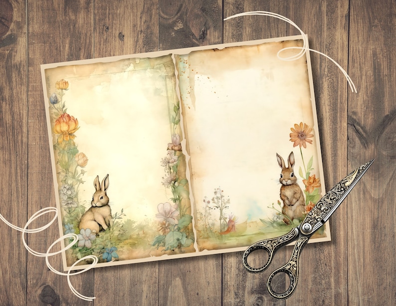 Może przedstawiać: Dwie strony w stylu vintage z ilustracją kr&oacute;lika po obu stronach. Strony są ozdobione kwiatami akwarelowymi i mają postarzony, zużyty wygląd. Para ozdobnych nożyczek leży na stronach.