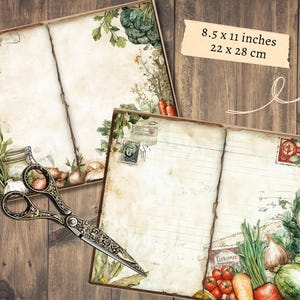 May include: Two open vintage-style journals with vegetable illustrations and blank pages, measuring 8.5 x 11 inches. A pair of ornate scissors rests on the wooden surface, alongside carrots, tomatoes, and other produce.