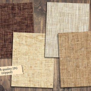May include: Four different textures of burlap fabric in brown, beige, cream, and tan colors. The fabric is displayed on a wooden background.