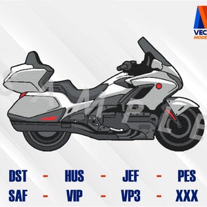 Puede incluir: Una motocicleta blanca y gris con un acento rojo en el lateral. La motocicleta tiene un parabrisas grande y una maleta en la parte trasera.