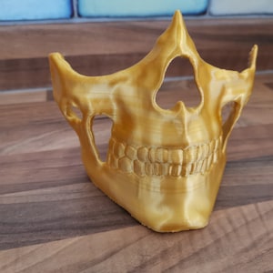 Higgs mask from Death Stranding