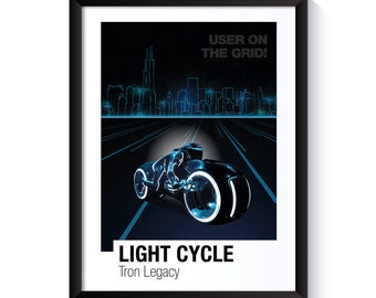 May include: A blue and black light cycle motorcycle from the movie Tron Legacy. The motorcycle is on a digital grid with a cityscape in the background. The text "USER ON THE GRID!" is above the motorcycle. The text "LIGHT CYCLE" and "Tron Legacy" is below the motorcycle.