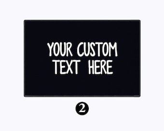 May include: Black rectangular sign with white text that says "YOUR CUSTOM TEXT HERE".