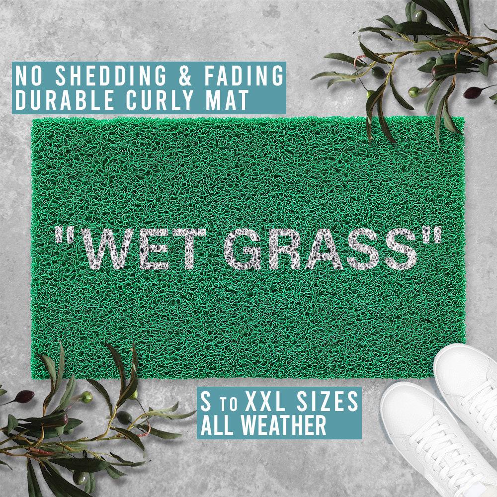 off white rug wet grass