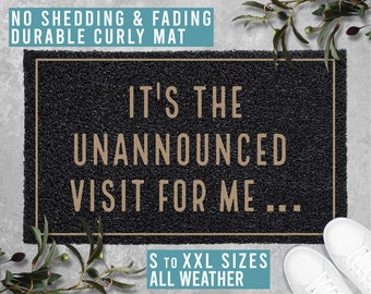 May include: Black doormat with the text "It's the unannounced visit for me..." in gold lettering. The doormat is made of a curly material and has a light blue border with the text "S to XXL sizes all weather".