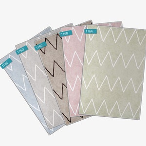 May include: Five different colored rugs with a white chevron pattern. The rugs are labeled 116E, 116D, 116C, 116B, and 116A.