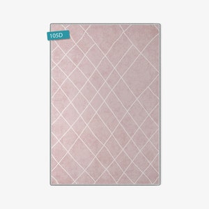 May include: A pink rug with a white diamond pattern. The rug has a subtle distressed look and is perfect for adding a touch of elegance to any room.