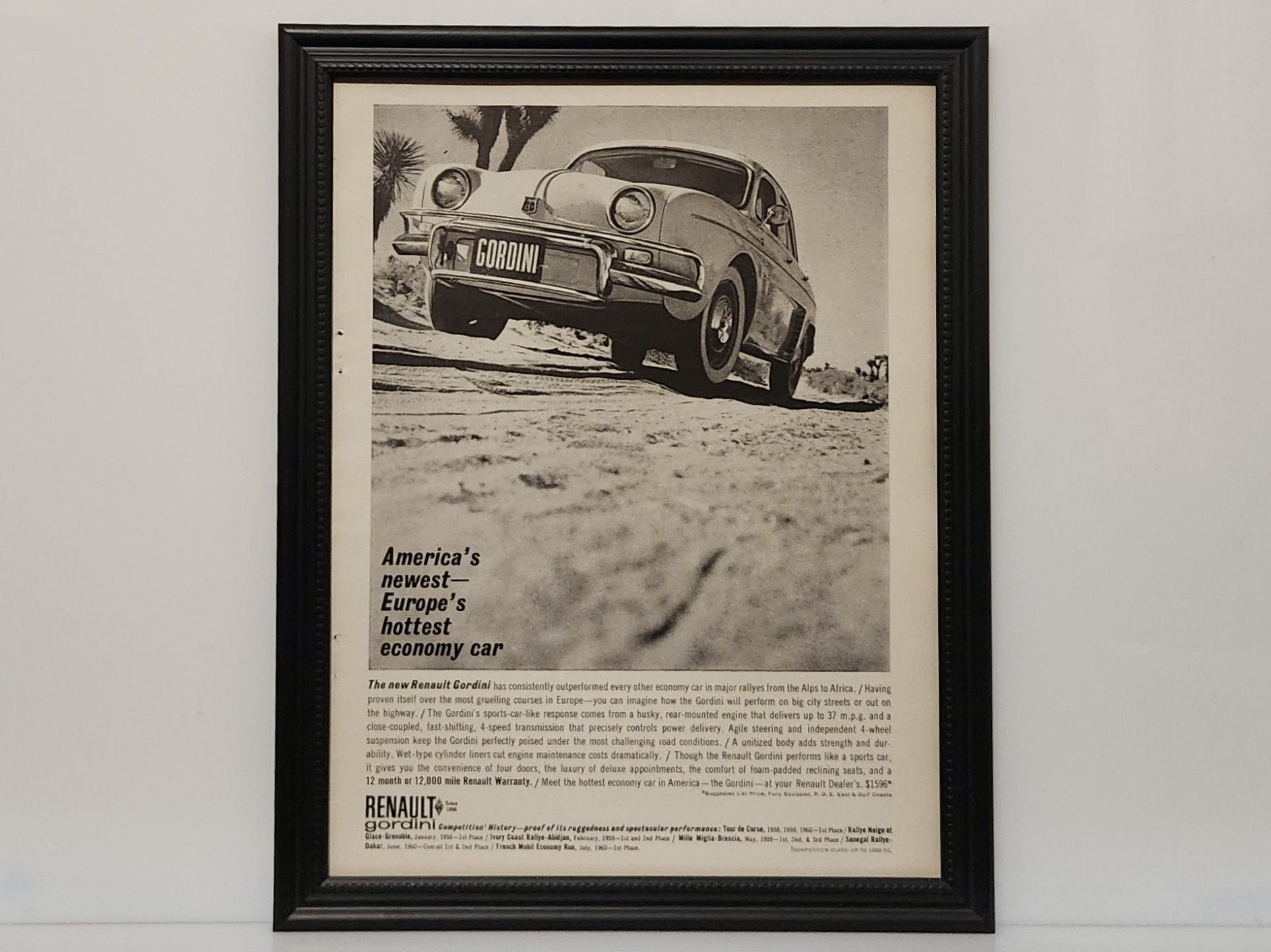 Framed 60's Vintage Car Ad 1961 Renault Dauphine Gordini Sedan B&W Advertisement Automotive Classic Wall Art Photo Poster