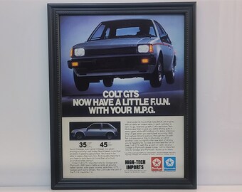 Framed Vintage 80's Car Ad 1983 Dodge Plymouth Colt GTS Hatchback Retro Automotive Advertisement Classic Wall Art Photo Poster