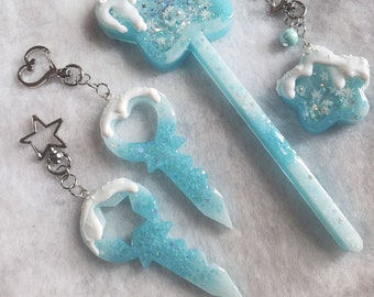 Snow Covered Glitter Winter Sky Blue Star, Heart Key Resin Epoxy Phone Charm