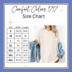 May include: A size chart for Comfort Colors 1717 t-shirts. The chart displays measurements for sizes S to 4XL, with width and length in inches. A person is wearing a cream-colored t-shirt with a denim jacket draped over their shoulders.