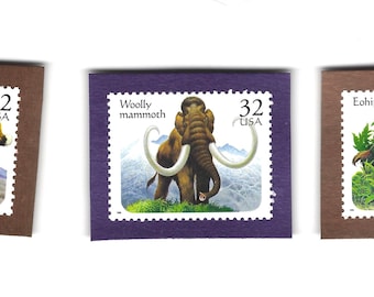 Set of 3 Extinct Mammals postage stamp Frig Magnets - Eohippus, Woolly Mammoth, and Saber-tooth cat!