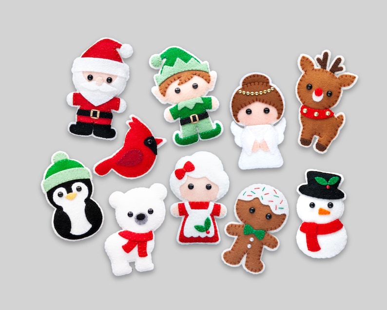 May include: A set of ten felt Christmas ornaments featuring a penguin, Santa Claus, a gingerbread man, a snowman, an elf, a reindeer, a cardinal, a polar bear, a girl in a red dress, and an angel.