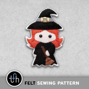 May include: A felt witch doll with a black hat, red hair, and a black dress, holding a broom. The witch has two black button eyes and a white face. The text "FELT SEWING PATTERN" is below the doll.