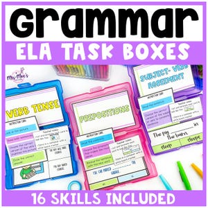 May include: A colorful educational resource titled "Grammar ELA Task Boxes" with 16 skills included. The image shows several open plastic boxes with grammar exercises, including verb tense, prepositions, and subject-verb agreement. The boxes are blue, pink, and purple.