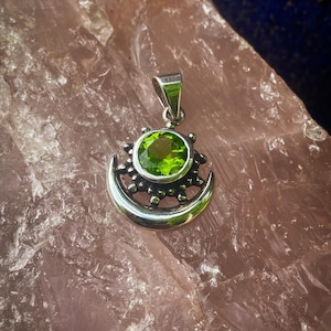 Precious Treasures / Faceted Peridot Sun and Moon Goddess Sterling Silver Pendant