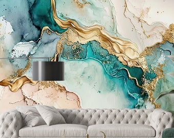 Puede incluir: Arte de pared abstracto con un diseño de acuarela turquesa, dorado y blanco. El diseño se asemeja a agua que fluye con acentos dorados y brillo.
