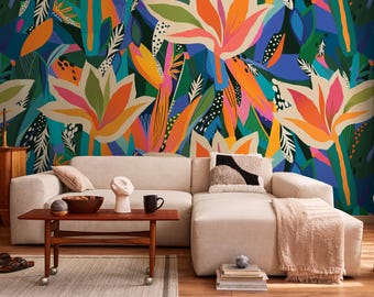 May include: A living room with a colorful floral mural as a backdrop. A beige sectional sofa is in front of the mural, with a wooden coffee table, decorative items, and a rug. The mural features large, stylized flowers in shades of orange, pink, and blue.