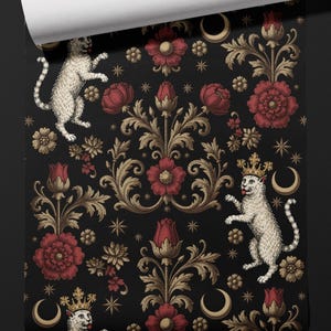 May include: Black wallpaper with a repeating pattern of white cats wearing crowns, red flowers, gold floral accents, crescent moons, and stars. Each roll is 61 cm wide.