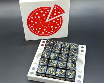 May include: A white dice tray with a pizza graphic and a set of black dice with gold markings. The dice are arranged in a grid, each displaying numbers and plus signs.