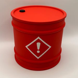 May include: A vibrant red barrel with a matching lid and a small black circular detail. It displays a white diamond hazard symbol with an exclamation mark. The barrel is cylindrical with horizontal ridges.