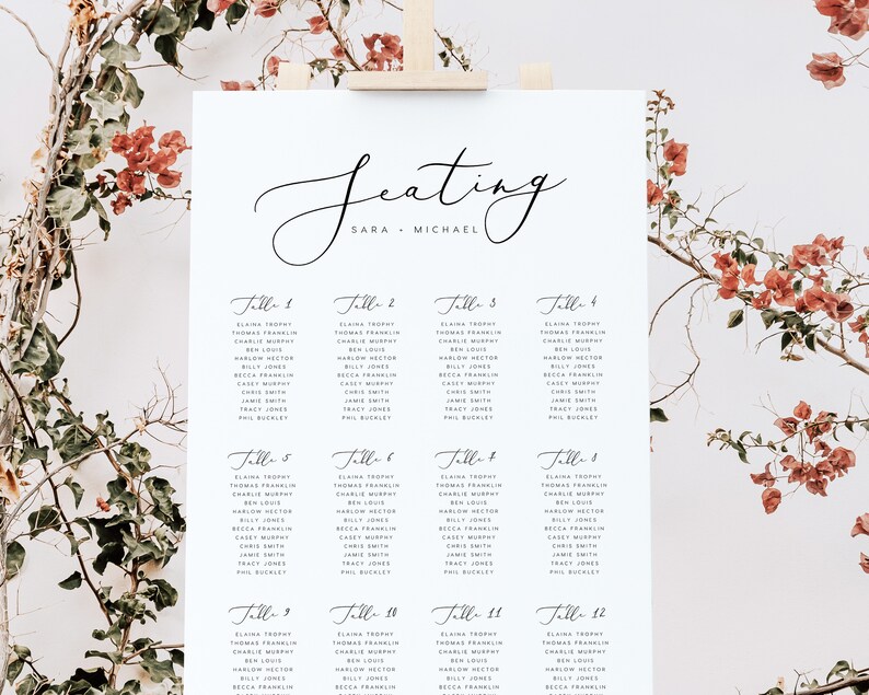 May include: A wedding seating chart with the names of guests listed under each table number. The chart is printed on white paper and has a simple, elegant design. The text "Seating" is written in cursive at the top of the chart, followed by "Sara & Michael".