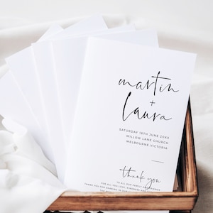 May include: A white thank you card with black calligraphy that reads "martin + laura" and the text "Saturday 16th June 20XX Willow Lane Church Melbourne Victoria" and "thank you" with the text "To all our family and friends for all you love, kindness and support. Thank you for sharing in our special day."