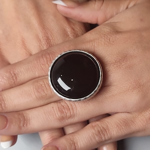 Black Onyx Silver Statement Ring: Adjustable Gemstone Cabochon