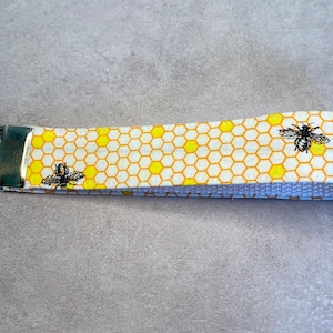 Honeycomb and bees wristlet lanyard