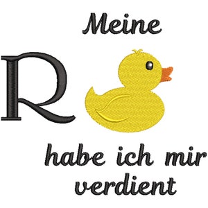 May include: A black and white image of a rubber duck with the text "Meine R habe ich mir verdient" in black cursive font.