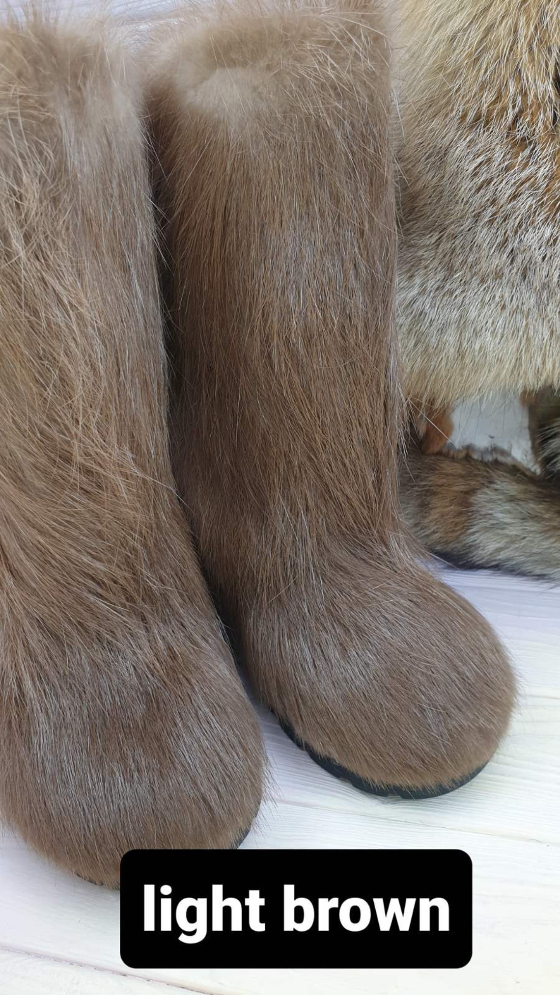 tall brown fuzzy boots