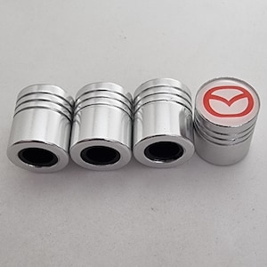 MAZDA Deluxe Wheel Valve Dust Caps. Non Stick Worlds biggest 6 colours all Cars Bikes
