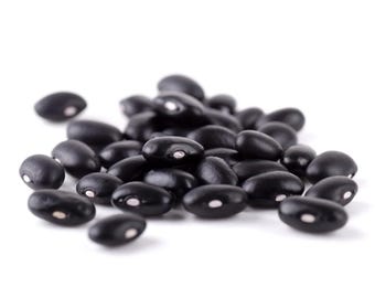 May include: A small pile of dried black beans, each featuring a smooth, dark exterior and a distinct, small white hilum on the side. The beans are oval-shaped and arranged in a loose cluster, showcasing their uniform color and texture.