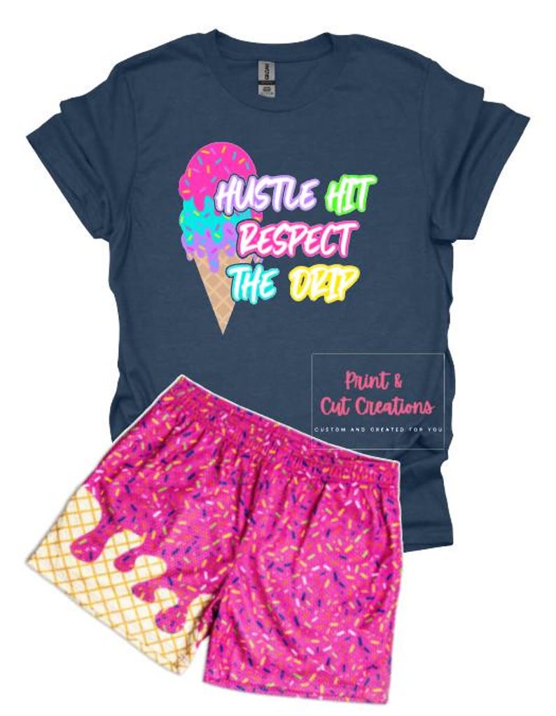 May include: A blue t-shirt with the text "Hustle Hit Respect The Drip" and a pink, blue, and yellow ice cream cone graphic. A pink and white patterned pair of shorts with a waffle cone design.