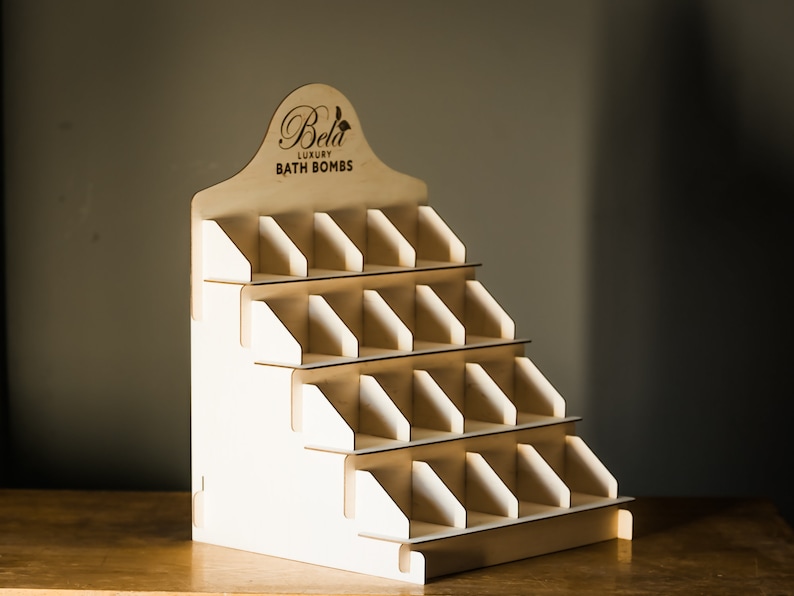 Multi-tiered soap organizer stand, perfect for holding and displaying soaps in the shower
