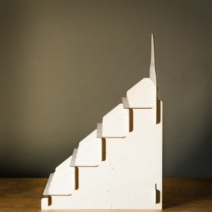 Soap rack with tiered design, perfect for organizing and displaying soaps in a bathroom
