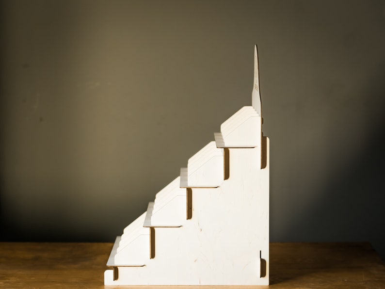Soap rack with tiered design, perfect for organizing and displaying soaps in a bathroom