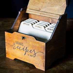 Vintage-style recipe card box with built-in holder and customizable labels for dishes