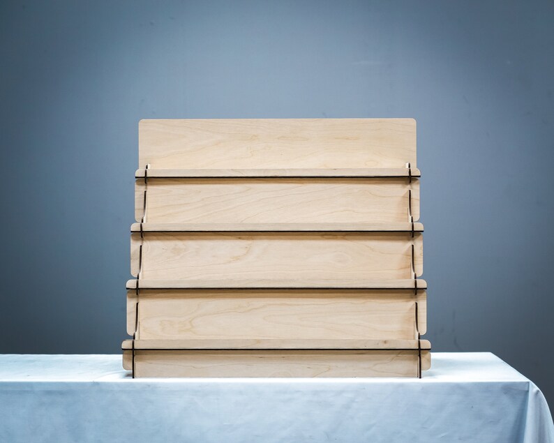 Collapsible display riser, ideal for craft fair displays and organizing products on a table top