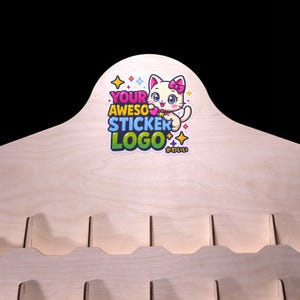 Close-up of branded header with UV-printed logo on natural birch.