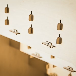 Display stand with dividers for soaps, ideal for bathroom decor and soap organization