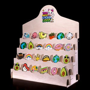 Stand filled with colorful sticker packs arranged across four rows.