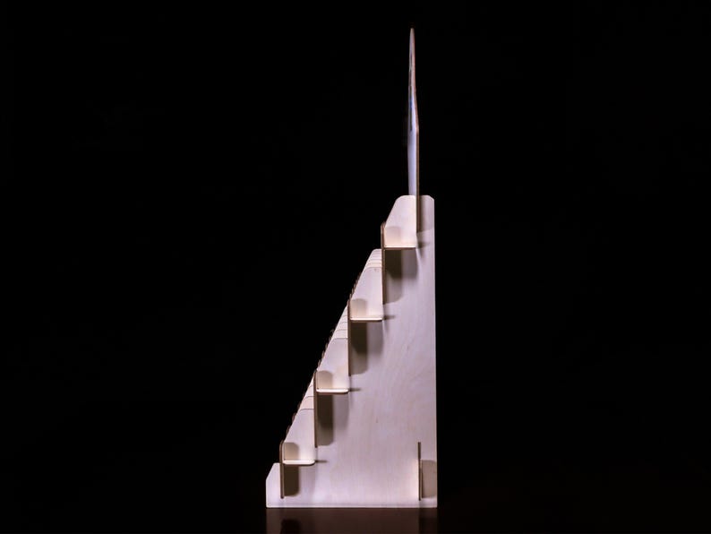 Side profile showing compact footprint and tier spacing.