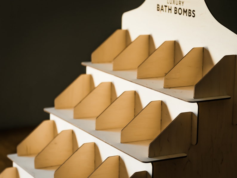 Elegant soap display stand with multiple tiers, perfect for showcasing soaps in a bathroom decor
