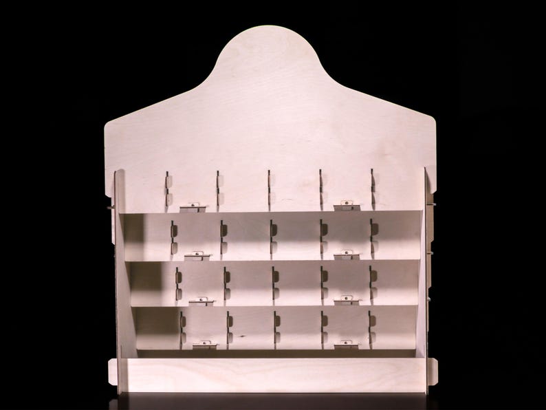 Rear view showing slotted shelves and dividers inside the birch frame.
