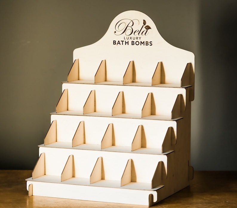 Multi-tier wooden craft fair display stand, ideal for organizing and displaying cards at market stalls